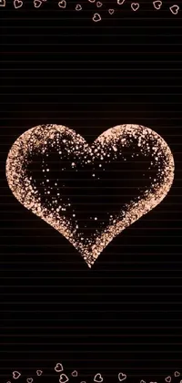 This phone live wallpaper features an intricately designed heart made of small hearts set against a black background