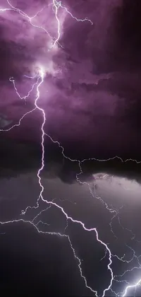 Add a touch of brilliance to your phone with this stunning live wallpaper! With cool purple-grey lighting and dramatic zoom photos, this wallpaper creates an epic scene that showcases the power of Zeus through the lightning bolts in the sky