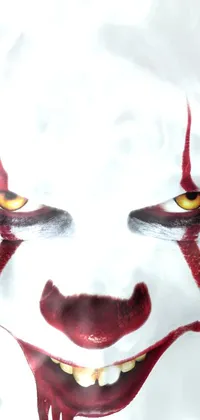 This live wallpaper features a close-up of a sinister clown's face, perfect for horror fans who want to add a spooky touch to their phone's background