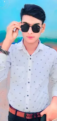 This live phone wallpaper boasts a fashionable digital image of a man donning white shirt and sunglasses