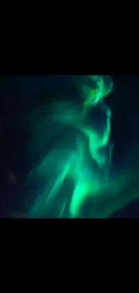 Introducing an captivating aurora borealis phone live wallpaper, showcasing a beautiful 4k holographic image of the Northern Lights dancing in the night sky - bringing the natural phenomenon to life in vibrant shades of purple-green and blue