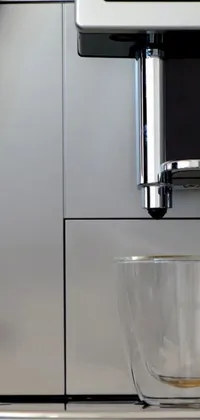 Looking for an ultra-realistic live wallpaper for your phone? Check out this breathtaking coffee machine wallpaper! Rendered to the highest level of detail, the coffee machine sits on a shiny countertop, with water that flows and droplets that gleam