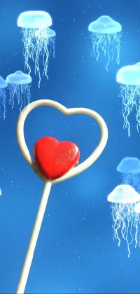 This phone live wallpaper features a stunning heart-shaped lollipop that stands out against a vibrant blue sky background