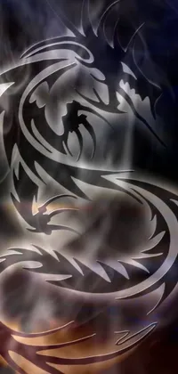 This phone live wallpaper showcases a powerful tribal dragon tattoo design on a dark background