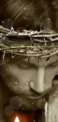 This captivating phone live wallpaper features a poignant image of a man adorned with a crown of thorns on his head, captured in a poignant video still