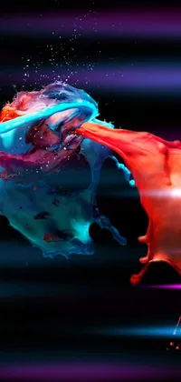 This live wallpaper features red and blue liquid constantly in motion on a black background, with splashes, smears, and swirls creating an amazing effect