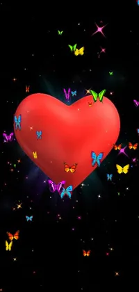 Looking for a cute and colorful live wallpaper for your phone? Look no further than this adorable design featuring a red heart surrounded by fluttering butterflies on a black background! The butterflies come to life with motion effects, while the heart pulsates and glows, creating a stunning visual display