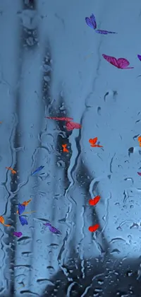 Enhance your phone's appearance with a stunning live wallpaper that captures the essence of a rainy day