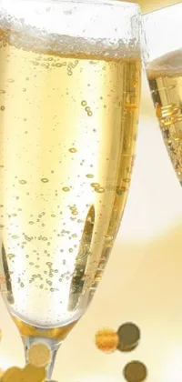 This live wallpaper showcases two glasses filled with champagne, positioned next to each other