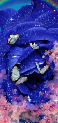 This stunning live phone wallpaper features a blue rose against a rainbow backdrop, with beautiful butterflies and foliage to add to the dreamy, ethereal atmosphere