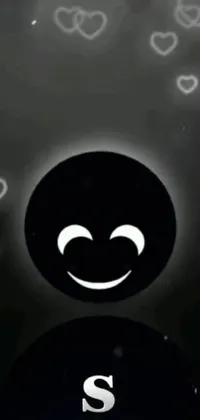 The phone live wallpaper showcases an up-close view of a mobile device displaying a bright yellow smiley face
