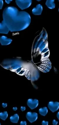 Looking for a stylish and serene phone wallpaper? Look no further than this stunning live wallpaper! Featuring a striking black background and complemented by beautiful blue hearts and a delicate butterfly, this wallpaper is sure to add a touch of nature and relaxation to your phone screen