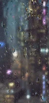 This live wallpaper features a serene cityscape seen through a rain-soaked window