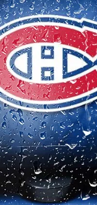 This live wallpaper for your phone features the iconic logo of the Montreal hockey team on a deep blue background