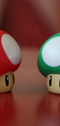 This live wallpaper shows two toy mushrooms on a wood table