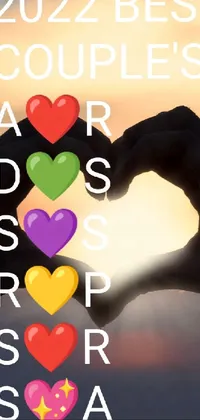This phone live wallpaper features a charming image of a person making a heart shape with their hands