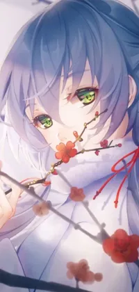 This Phone Live Wallpaper showcases a beautiful close-up of a delicate flower being held in someone's hand