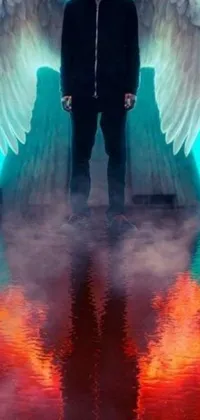 This dynamic live wallpaper depicts a hooded figure with wings, standing on a stage in the midst of a fiery battle between heaven and hell