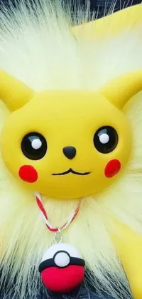 This phone live wallpaper features a fur-covered Pikachu stuffed toy with piercing eyes