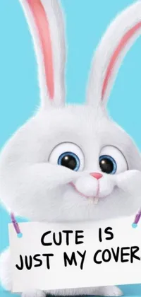 This animated live wallpaper features a lovely white rabbit that holds up a sign reading, "Cute is just my cover"