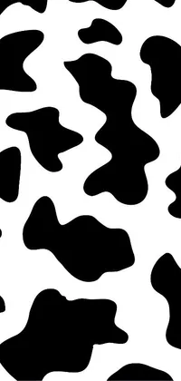 This phone live wallpaper features a playful pattern of black and white spots on a white background, inspired by cartoon aesthetic