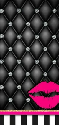 Looking for a chic and luxurious live wallpaper for your phone? Check out this trendy design featuring a gorgeous pink lipstick made of diamonds on a monochromatic black and white background