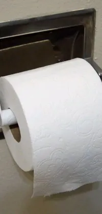 This live wallpaper features an eye-catching close-up of a roll of toilet paper