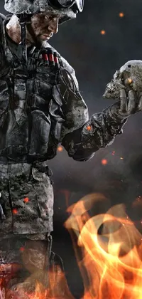 This incredible phone live wallpaper depicts a soldier holding a skull against a dark background