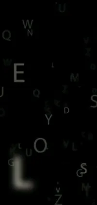 This live phone wallpaper features a keyboard with letters floating out of it, creating a mesmerizing display