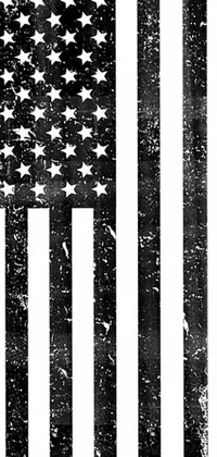 Looking for an elegant and striking live wallpaper for your phone? Look no further than this stunning black and white photograph of an American flag