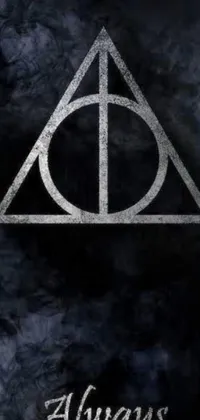 This live wallpaper features a close-up of the iconic Harry Potter logo on a black background