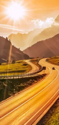 This live wallpaper showcases a car driving on a rural road during sunset