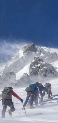 This dynamic live wallpaper captures the thrill of skiing down a snow covered slope