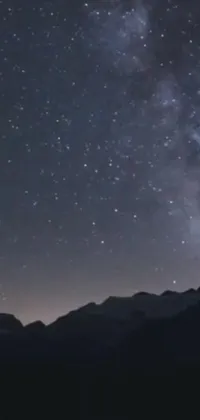 Transform your phone's backdrop with this incredible live wallpaper featuring a beautiful night sky brimming with countless stars