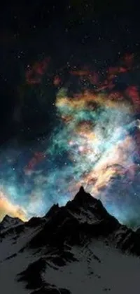 This live wallpaper features a snowy mountain under a night sky with beautiful stars and colorful clouds