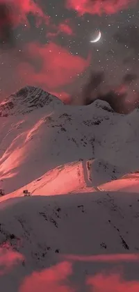 This live wallpaper captures the beauty of a snow-covered Swiss mountain