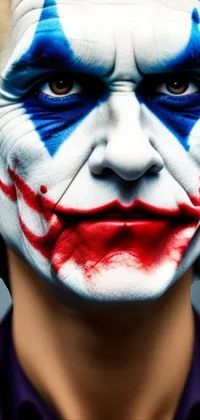 This phone live wallpaper showcases a striking close-up of Joker makeup