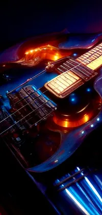 This live wallpaper features a close-up of a guitar and double bass in the background creating a smooth, jazzy vibe