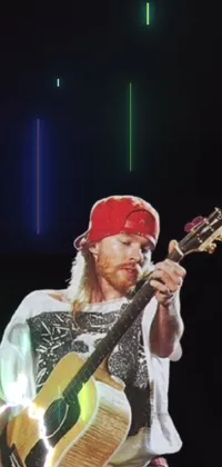 This dynamic phone live wallpaper boasts a colorful image of a guitar player in a red bandana