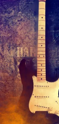 This stunning live wallpaper for your phone showcases a black and white photograph of a guitar, with a vintage, grunge feel