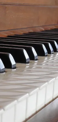 Transform your phone's home screen with a hyperrealistic live wallpaper featuring a close-up view of piano keys