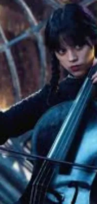 Introducing a stunning phone live wallpaper featuring an elegant woman playing a cello