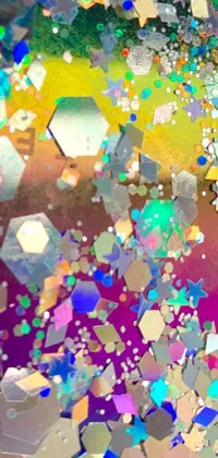 This phone live wallpaper features confetti, microscopic photo, panfuturism, hexagons, glitched fantasy painting, space stars, and mixed media galaxy all colliding on screen in a visually stunning display