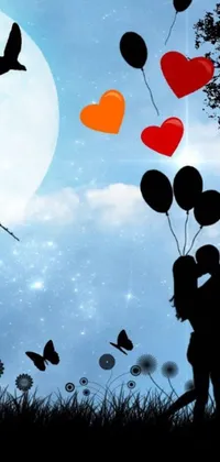 This live wallpaper showcases a dreamy display of a kissing couple under the full moon in front of a scenic background