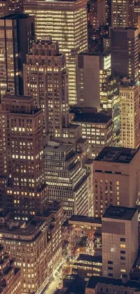 This live wallpaper brings a stunning aerial view of a city at night to your phone
