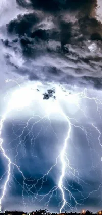This live wallpaper features a dramatic lightning storm over a city, in stunning white and blue lighting