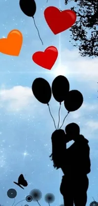 This phone live wallpaper showcases a beautiful romantic scene of a couple kissing in a vibrant field with balloons floating in the air, creating a playful atmosphere