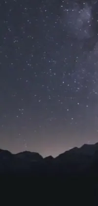 This live wallpaper showcases a beautiful night sky filled with sparkling stars creating a mesmerizing view