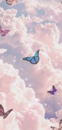 This live phone wallpaper features beautiful butterflies against a serene blue sky with cotton candy clouds