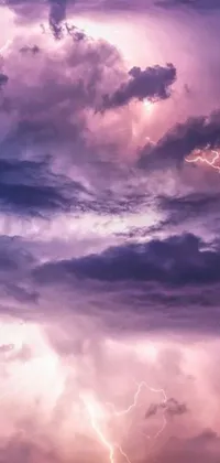 This stunning live wallpaper features a breathtaking sky filled with clouds and lightning in shades of purple